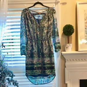 Stunning patterned, long-sleeved dress